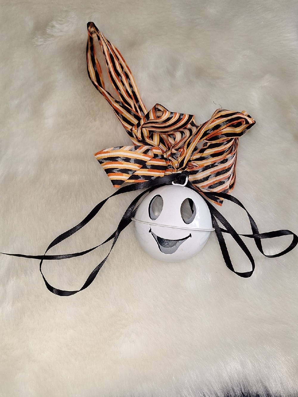 Smiling White Ghost Bell Ornament with Black & Orange Ribbon